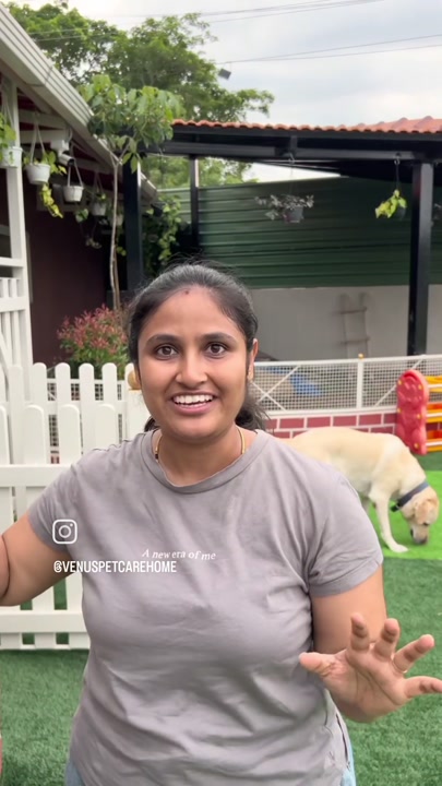 Staff member introducing the pet cafe facility